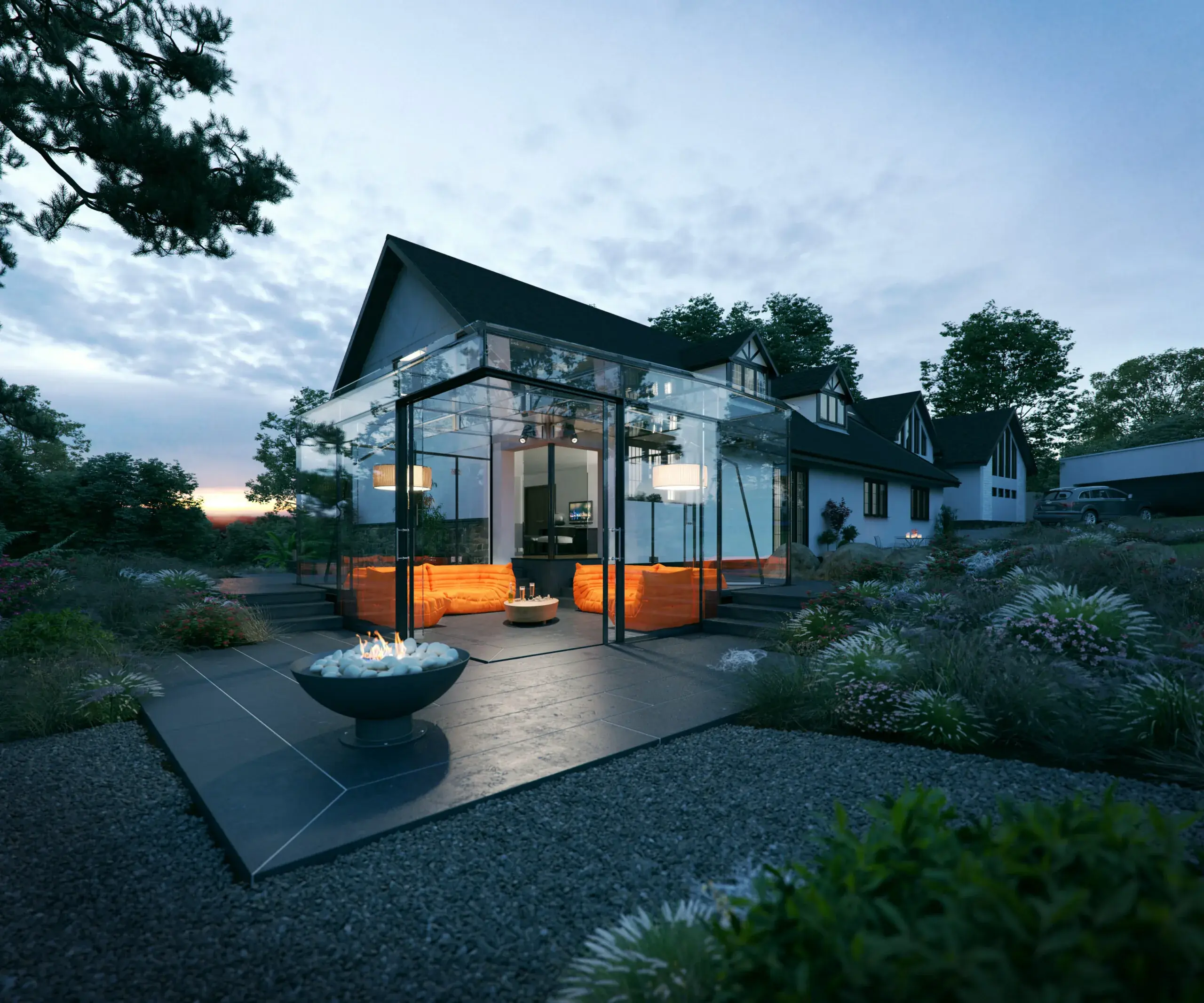 GlasSpace glass extension at dusk with orange seating
