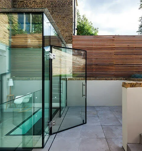 St James glass extension opening onto a compact London courtyard